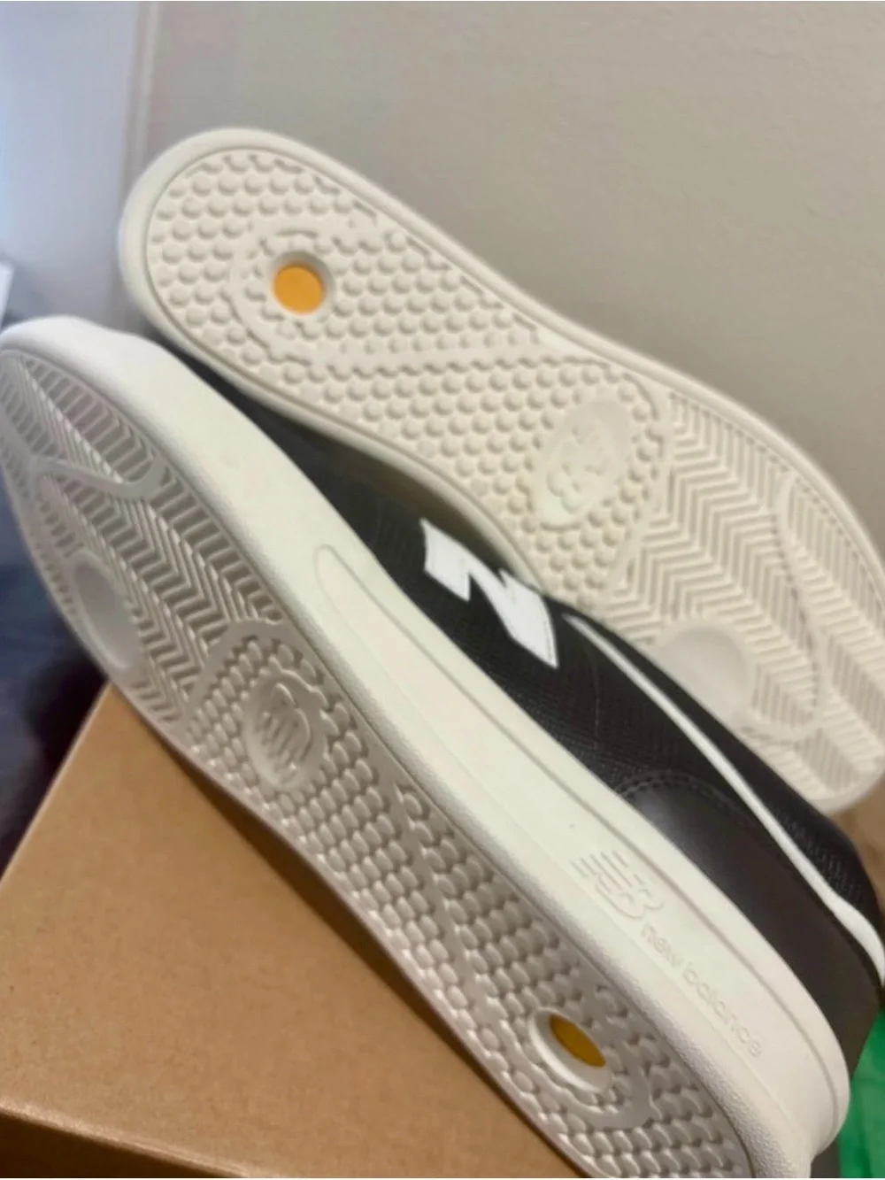 New Balance Men's Black and White Casual Sneakers